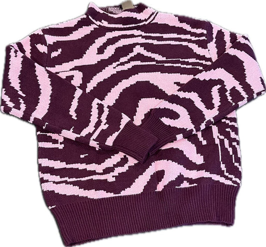 the label WOMEN'S TOPS XS